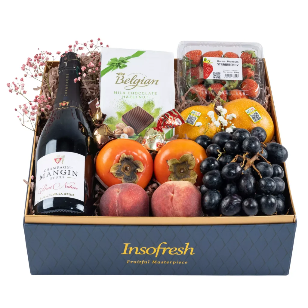 Insofresh Indulge Royal Box featuring Champagne Mangin, Belgian milk chocolate, Korean strawberries, peaches, persimmons, and grapes — a premium delivery hamper for fruit delivery in Singapore.