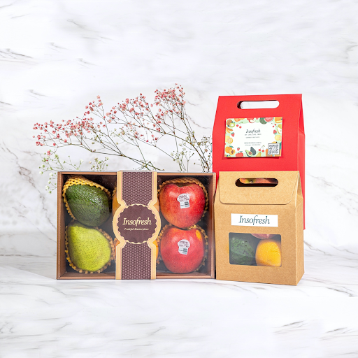 Insofresh fruit hamper delivery in Singapore featuring premium apples, pears, and avocados in elegant gift boxes, ideal for birthdays