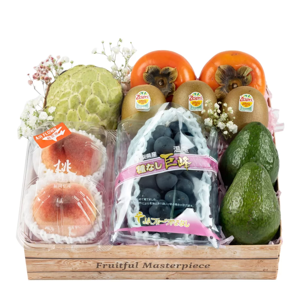 Insofresh premium fruit hamper in Singapore featuring Japanese peaches, seedless grapes, avocados, kiwis, and custard apples, perfect for luxury gift hamper delivery.